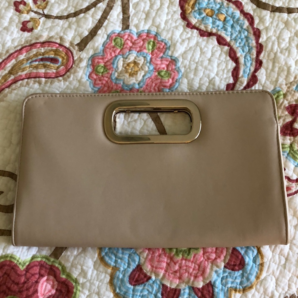 Clutch in Tan color excellent condition